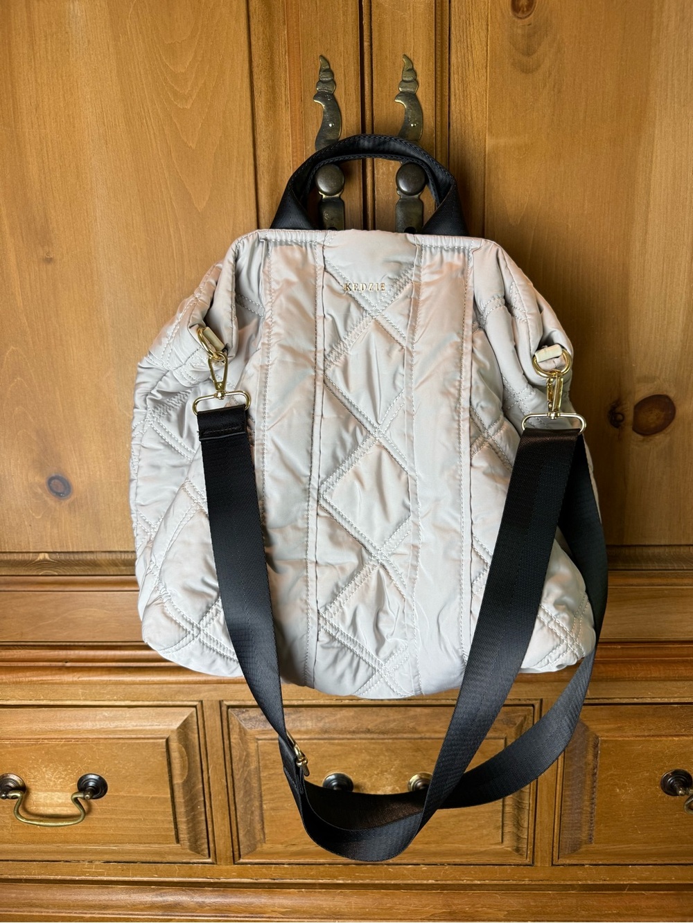 Kedzie Cloud 9 Convertible Sling Beige Backpack Black Straps and Gold Hardware